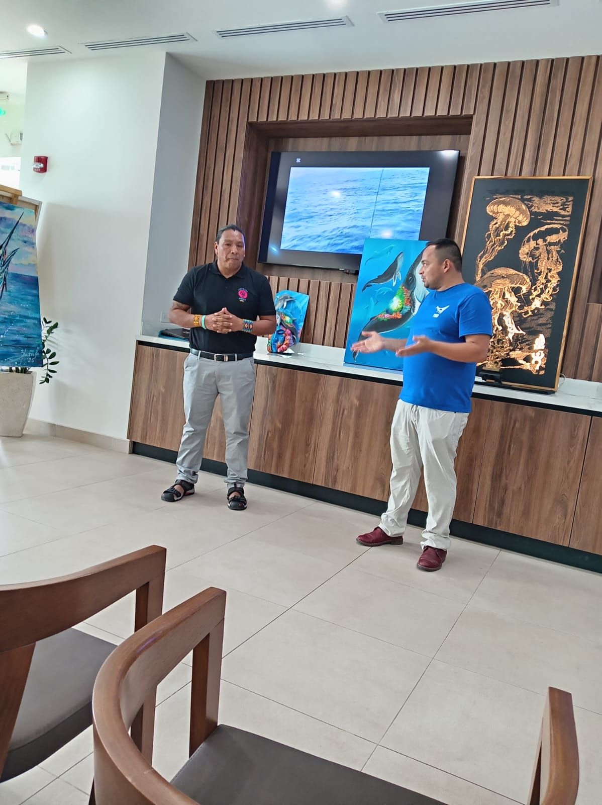 Kamel being introduced on stage at the Flamingo Marina Whale & Dolphin Festival 2026