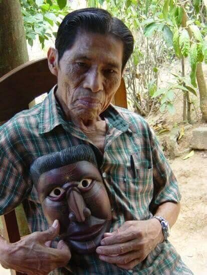 Ismael González Lázaro holding one of his masks