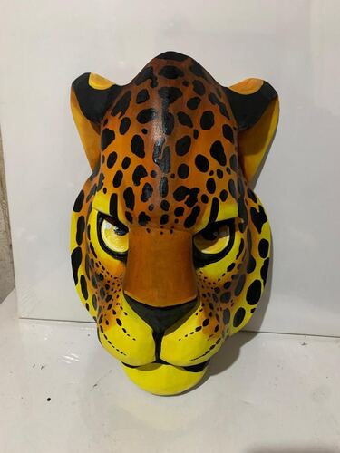 Boruca mask carved with a jaguar motif