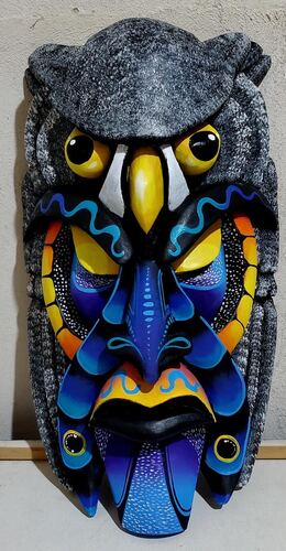 Boruca mask carved with an owl motif