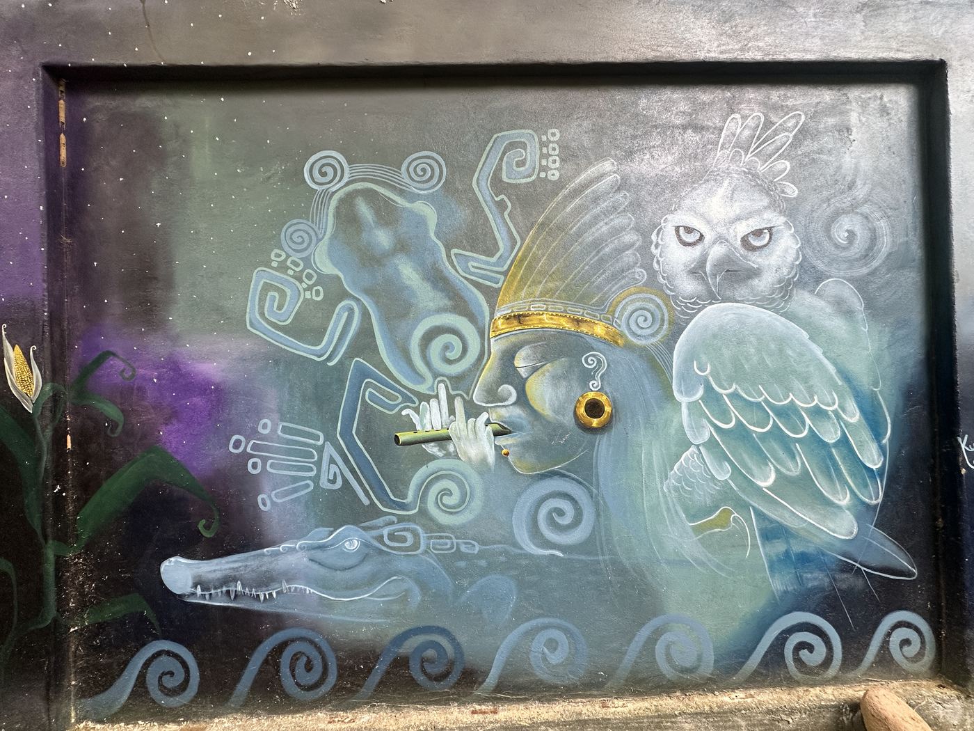Shaman with owl and crocodile mural at La Cusinga Lodge, Uvita