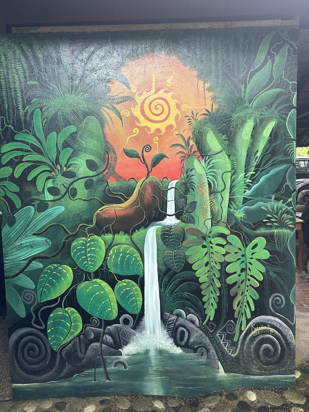 Jungle waterfall guardian mural at La Cusinga Lodge, Uvita